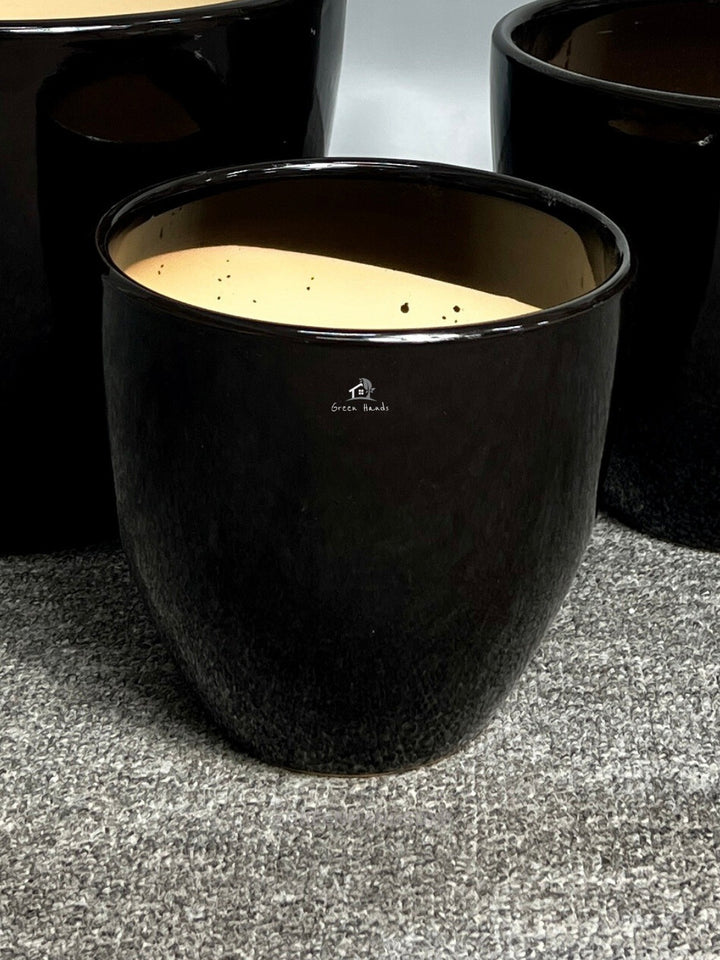 Sleek Black Ceramic Pots in Dubai & Abu Dhabi: Minimalistic Modern Design with Drain Holes